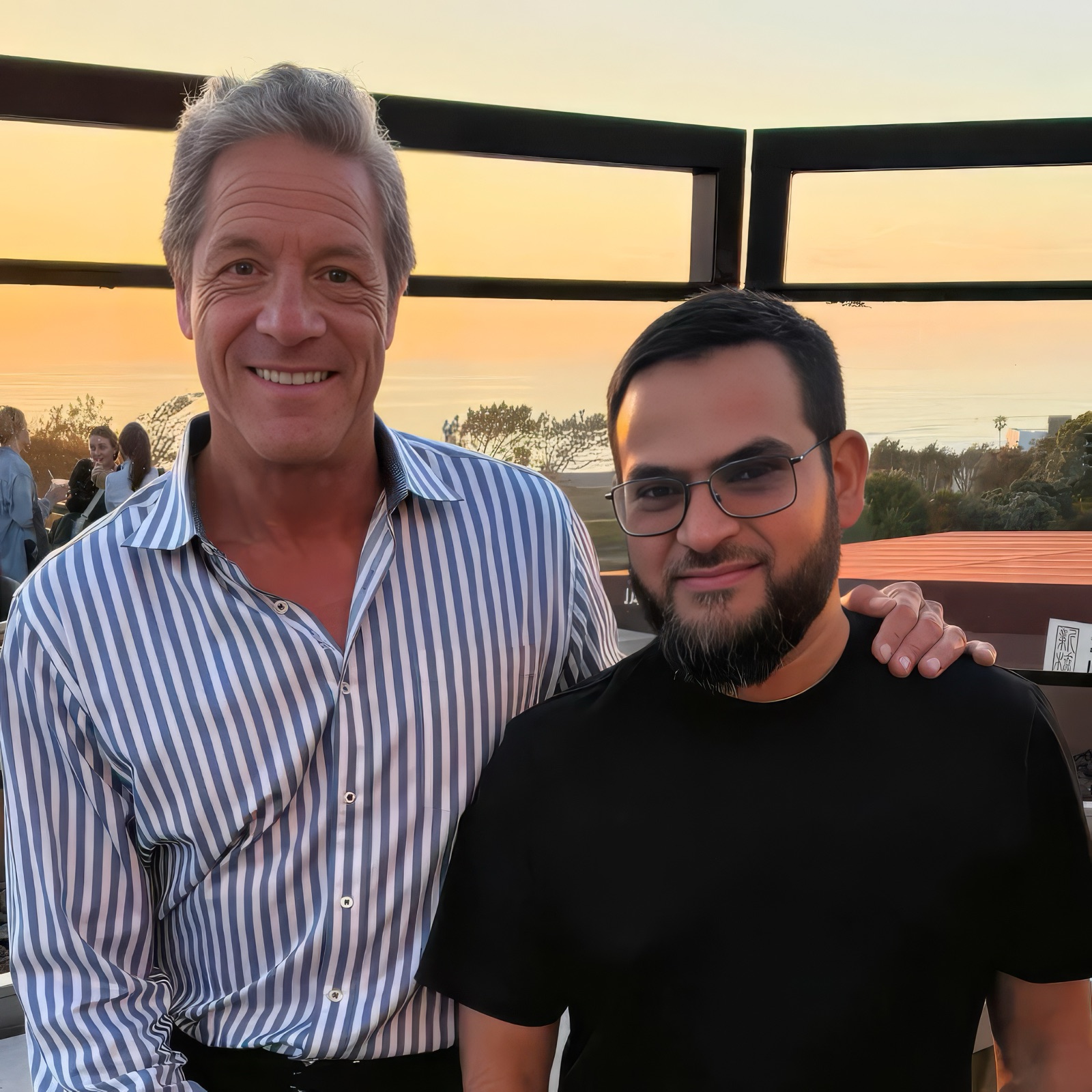 Muhammad Asmal standing with John Assaraf, New York Times best-selling author